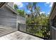 Exterior view from the balcony showing tropical foliage at 2033 Arbor Dr, Clearwater, FL 33760