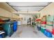 This spacious garage offers ample storage space, a washer/dryer, and convenient access to the home's interior at 2033 Arbor Dr, Clearwater, FL 33760