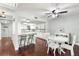 Modern kitchen with white cabinetry, granite countertops, and stainless steel appliances at 2033 Arbor Dr, Clearwater, FL 33760