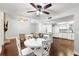Open-concept living and dining area with hardwood floors and abundant natural light at 2033 Arbor Dr, Clearwater, FL 33760