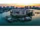 Waterfront condo building with private boat docks along the Intracoastal Waterway, offering serene coastal living at 205 Brightwater Dr # 101, Clearwater Beach, FL 33767