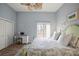 Bedroom featuring a desk and chair, and a comfortable bed at 205 Brightwater Dr # 101, Clearwater Beach, FL 33767