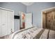 A comfortable bedroom with two closets and access to a bathroom with a shower at 205 Brightwater Dr # 101, Clearwater Beach, FL 33767