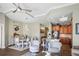 Open concept living and dining area with stylish furniture and natural light at 205 Brightwater Dr # 101, Clearwater Beach, FL 33767
