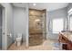Beautiful main bathroom featuring a large walk-in shower, a toilet, and an undermount sink at 205 Brightwater Dr # 101, Clearwater Beach, FL 33767