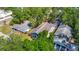Aerial view of neighborhood showing property with fenced yard and mature trees at 207 W Chelsea St, Tampa, FL 33603