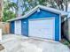 Detached two car garage with two doors, and access to the backyard at 207 W Chelsea St, Tampa, FL 33603