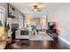 Spacious living room with hardwood floors, a fireplace, and a TV for entertainment at 207 W Chelsea St, Tampa, FL 33603