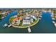 Waterfront home on a point lot with a private dock, pool, balconies, and lush landscaping at 2087 Michigan Ne Ave, St Petersburg, FL 33703