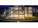 Stylish three-story home with a private dock, a sleek pool, and lush landscaping for relaxing waterfront enjoyment at 2087 Michigan Ne Ave, St Petersburg, FL 33703