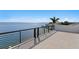 Spacious covered balcony featuring tile flooring and stunning waterfront views at 2087 Michigan Ne Ave, St Petersburg, FL 33703