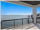 Balcony showcasing waterfront views with a black railing, offering a serene outdoor living space at 2087 Michigan Ne Ave, St Petersburg, FL 33703