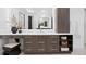 Modern bathroom featuring a double vanity, ample storage, and stylish decor at 2087 Michigan Ne Ave, St Petersburg, FL 33703