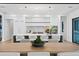 Bright kitchen featuring a large island with seating, modern appliances, and stylish countertops at 2087 Michigan Ne Ave, St Petersburg, FL 33703