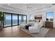 Beautiful main bedroom with water views, wood floors, and a comfortable sitting area at 2087 Michigan Ne Ave, St Petersburg, FL 33703