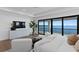 Stunning main bedroom featuring water views, wood floors, and a sitting area at 2087 Michigan Ne Ave, St Petersburg, FL 33703