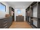 Well-organized walk-in closet with custom shelving and ample storage space at 2087 Michigan Ne Ave, St Petersburg, FL 33703
