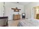 Light filled bedroom with an adjacent bathroom and a storage closet at 2202 Colewood Ln, Dover, FL 33527