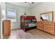 bedroom with bunkbeds and wooden flooring at 2202 Colewood Ln, Dover, FL 33527