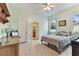 Bright bedroom featuring a neutral color scheme and en suite bathroom at 2202 Colewood Ln, Dover, FL 33527