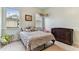 Cozy bedroom with ample natural light and comfortable furnishings at 2202 Colewood Ln, Dover, FL 33527