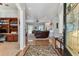 Warm entryway leading to a spacious living area with hardwood floors and an open layout at 2202 Colewood Ln, Dover, FL 33527