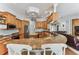 Spacious kitchen featuring granite countertops, wood cabinets, and stainless steel appliances at 2202 Colewood Ln, Dover, FL 33527
