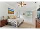 Inviting main bedroom with comfortable bedding and ample natural light at 2202 Colewood Ln, Dover, FL 33527