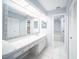 This bathroom offers an oversized vanity and plenty of room for storage and getting ready at 2456 Alhambra St, Clearwater, FL 33761