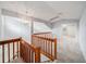 This hallway features new carpet, fresh paint and updated lighting at 2456 Alhambra St, Clearwater, FL 33761