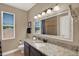 Bathroom featuring granite countertops, an extra wide mirror, and tile floors at 2614 Brookforest Dr, Wesley Chapel, FL 33544