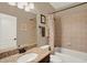 Full bathroom with granite countertop, vanity sink, tiled shower and bathtub at 2614 Brookforest Dr, Wesley Chapel, FL 33544