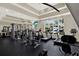 A well-equipped community fitness center with modern machines and large windows, providing a bright and motivating workout space at 2614 Brookforest Dr, Wesley Chapel, FL 33544