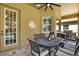 Outdoor dining area with a built-in grill at 2614 Brookforest Dr, Wesley Chapel, FL 33544