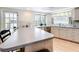 Bright kitchen with updated appliances, ample counter space, and a breakfast bar at 2742 Sea Pines E Cir, Clearwater, FL 33761