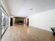 Unstaged living room with natural light and hardwood flooring at 2742 Sea Pines E Cir, Clearwater, FL 33761