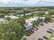 Community aerial view showcasing lush landscaping, parking, and well-maintained exterior features of the multi-Gathering units at 2840 Somerset Park Dr # 203, Tampa, FL 33613