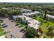 Scenic aerial view of a well-planned residential community with lush greenery and ample parking at 2840 Somerset Park Dr # 203, Tampa, FL 33613