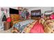 Comfortable bedroom boasts neutral tones, a large bed, and ample closet space for storage at 2840 Somerset Park Dr # 203, Tampa, FL 33613