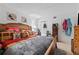 Bright bedroom featuring ample storage, natural light, and cozy decor at 2840 Somerset Park Dr # 203, Tampa, FL 33613