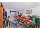 Open-plan living and dining area with plenty of natural light streaming through the windows at 2840 Somerset Park Dr # 203, Tampa, FL 33613
