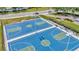 Aerial view of a new basketball court showing crisp lines and vibrant colors at 30140 Barnaby Ln, Wesley Chapel, FL 33543