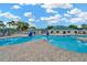 Relaxing community pool with plenty of seating and clear blue water at 30140 Barnaby Ln, Wesley Chapel, FL 33543
