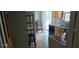 Practical kitchen featuring wood cabinets, a breakfast nook, and backyard access at 3026 19Th Sw Pl, Largo, FL 33774
