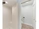 Clean bathroom with white tiled shower and adjacent toilet room at 3330 46Th E Ter, Bradenton, FL 34203