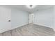 Inviting bedroom featuring wood-look floors, light-colored walls, and a ceiling fan at 3330 46Th E Ter, Bradenton, FL 34203