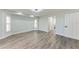Bedroom with wood-look flooring, bay windows and ensuite access at 3330 46Th E Ter, Bradenton, FL 34203