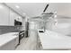 Modern kitchen with a large island and stainless steel appliances at 3330 46Th E Ter, Bradenton, FL 34203
