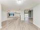 Open-concept layout featuring kitchen island and spacious living area at 3330 46Th E Ter, Bradenton, FL 34203