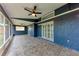 Enjoy this covered screened patio with ceiling fans, perfect for outdoor living space at 3330 46Th E Ter, Bradenton, FL 34203